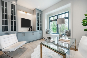 Elegant Family Room Cabinetry with Olon Velour Touch Panels